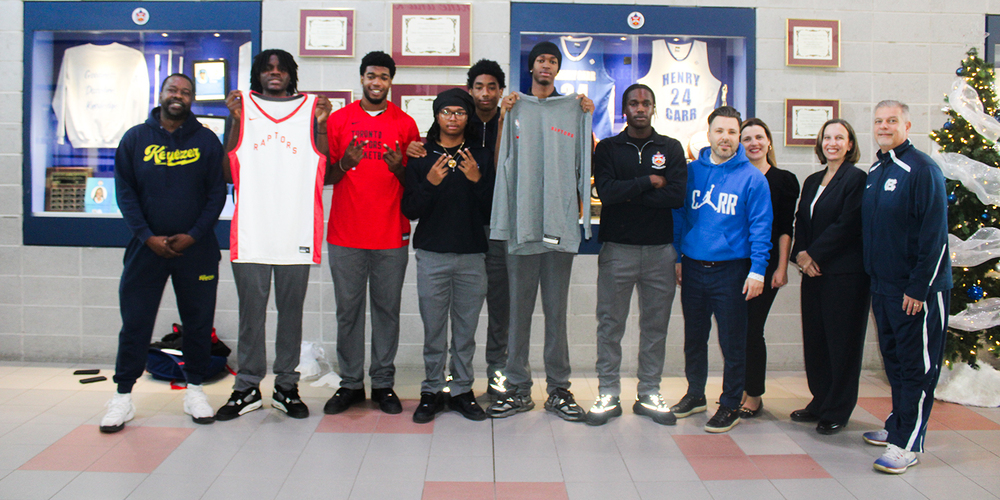 Group photo of Father Henry Carr students, staff and MLSE staff