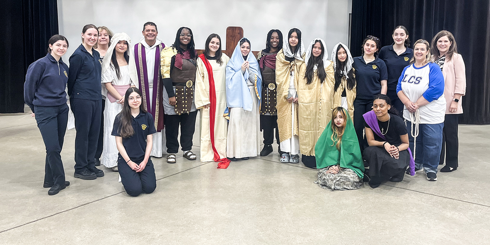 Group photo of the Stations of the Cross performers as well as helping students and staff