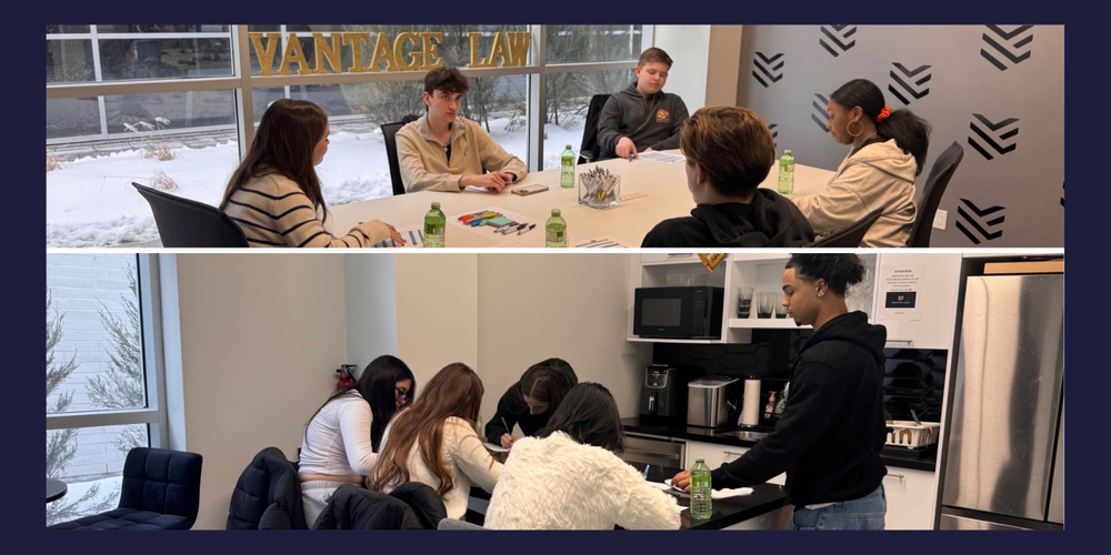 Students at Vantage Law working at a desk