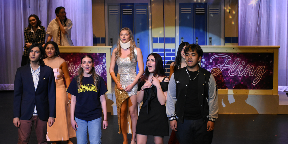 Photo of Redmond students performing on stage