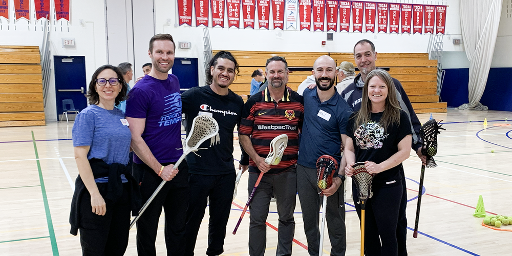 Photo of educators with lacrosse gear during the PD Day