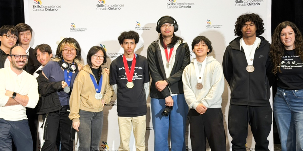 Group photo of JCM students with their medals