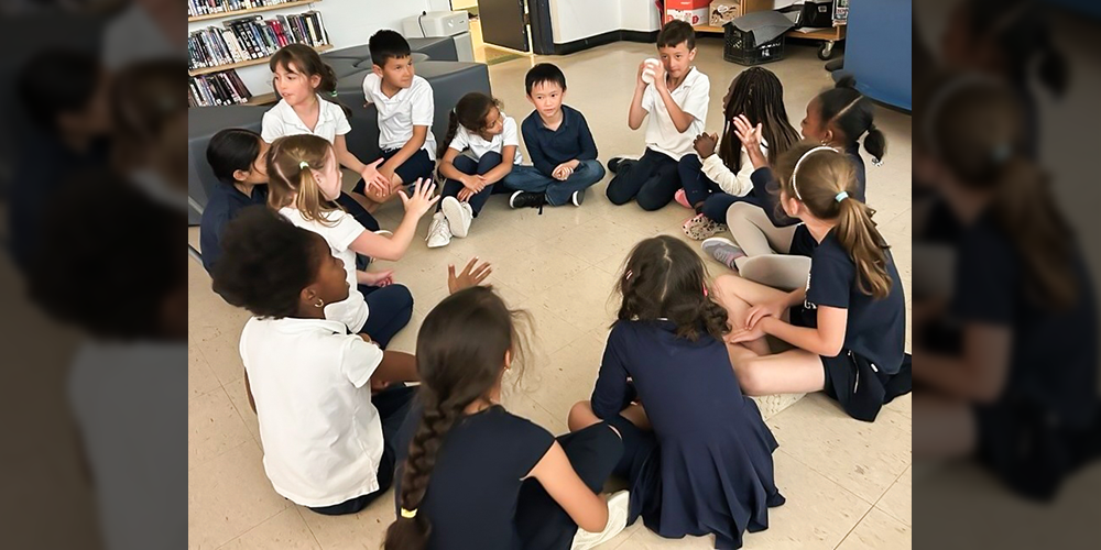Photo of students doing an activity in a circle
