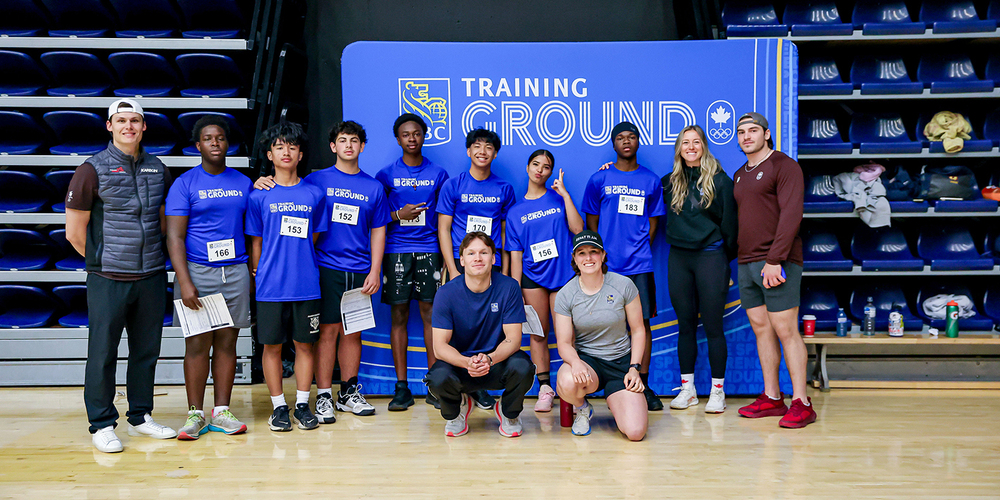 Group photo of JCM athletes with trainers at RBC Training Ground