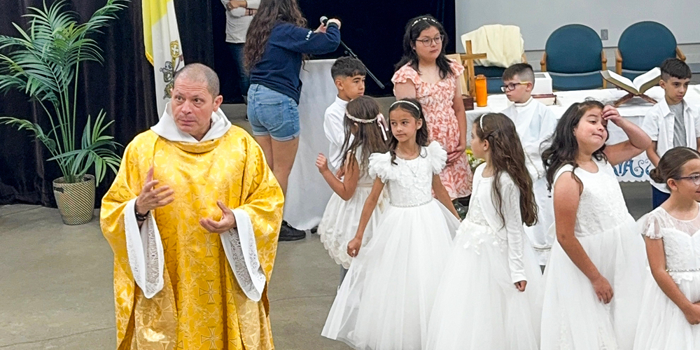 Photo of Father Gustavo leading the Mass