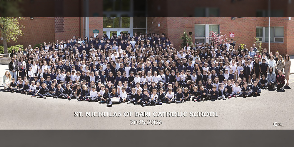 Group photo in front of the St. Nicholas of Bari Catholic School building of the 2025-2026 graduating class and the school staff
