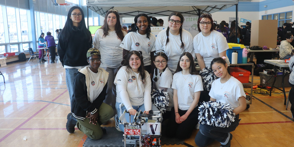 Photo of Loretto College School's robotics team with the robot they built