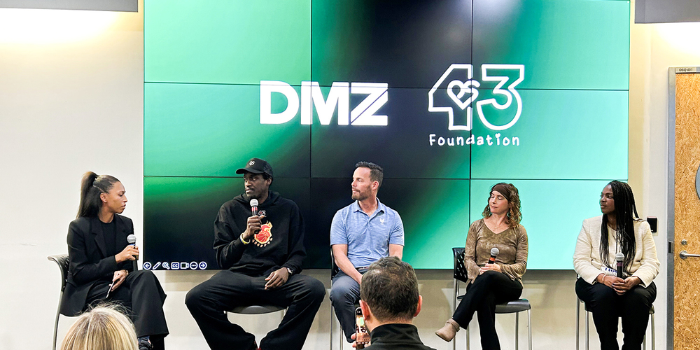 Photo of Principal Lorraine Van Zon of Bishop Macdonell Catholic Elementary School on stage with former Toronto Raptor and NBA All-Star Pascal Siakam, Dakota Whyte — Executive Director of the PS43 Foundation, James Hayes of Cyber Legends, and Erica Derrickson of English Islands at an exclusive event hosted at Toronto Metropolitan University’s DMZ, one of the world’s leading incubators for early-stage tech startups