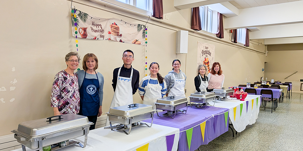 Photos of the MPSJ students serving breakfast with the members of the Catholic Women's League