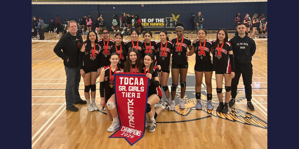 Volleyball team posing with champions 2026 banner