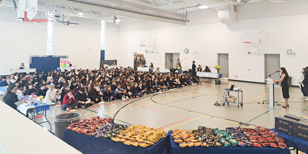 Photo of the assembly with students gathered