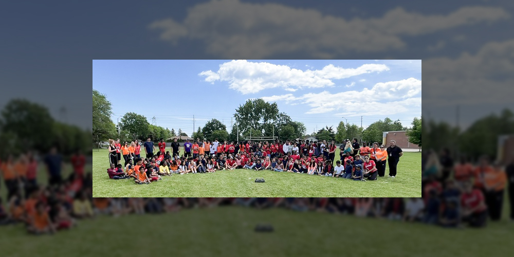 Group photo of St. Thomas More students at the games