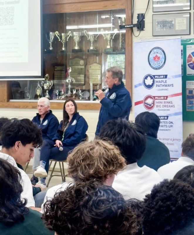 Photo of Chaminade students listening to the presentation