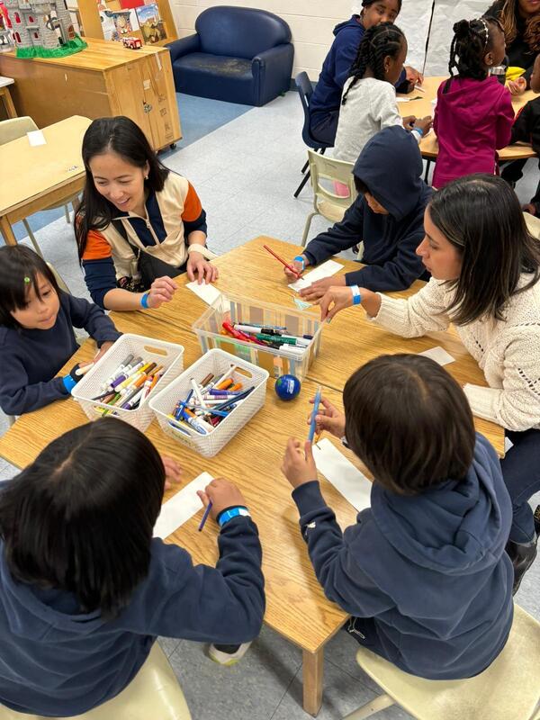 Photo of students enjoying a creative activity during the evening
