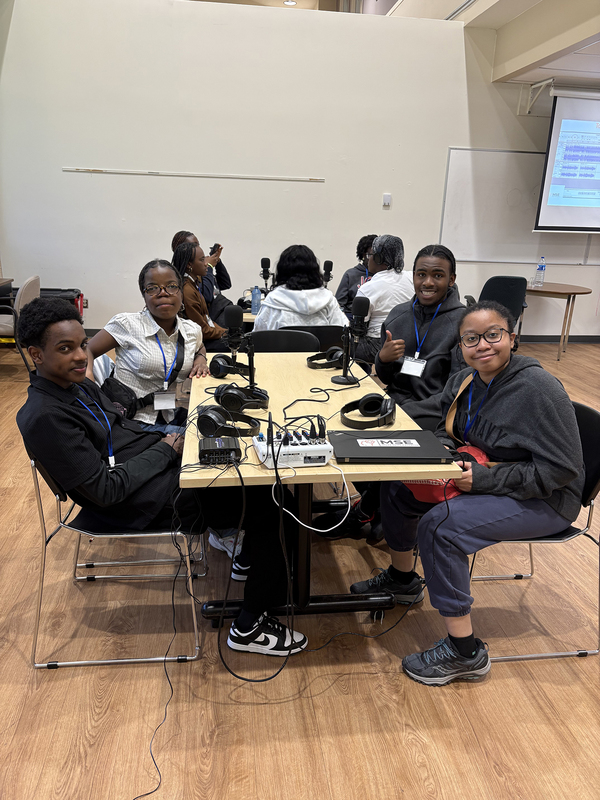 Photo of St. Oscar Romero students attending the symposium
