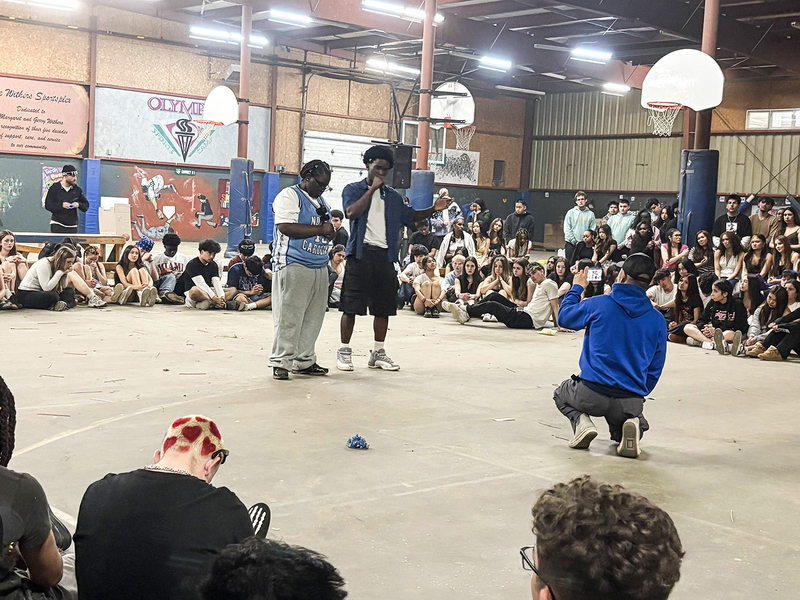 Photo of students doing a group exercise at Camp Olympia