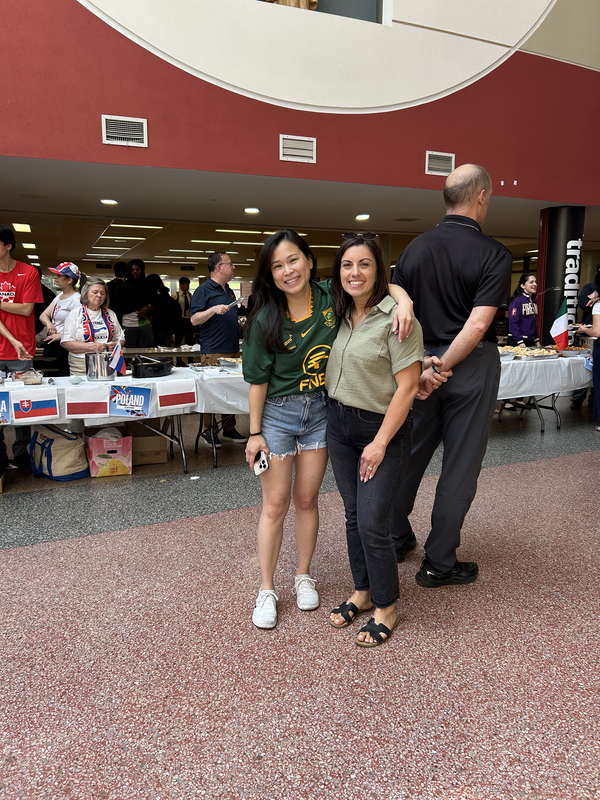 Photo of two staff members during the event