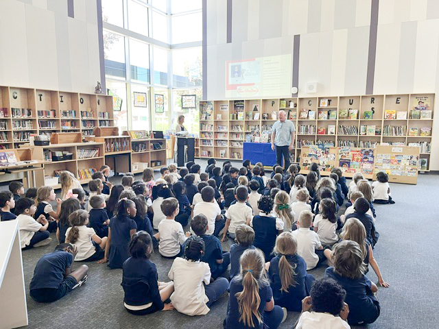 Photo of Holy Angels students listening to the presentation