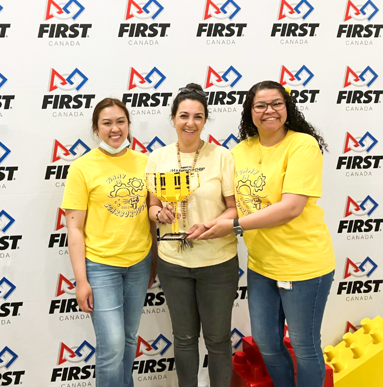 Photo of St. Albert staff accepting their trophy