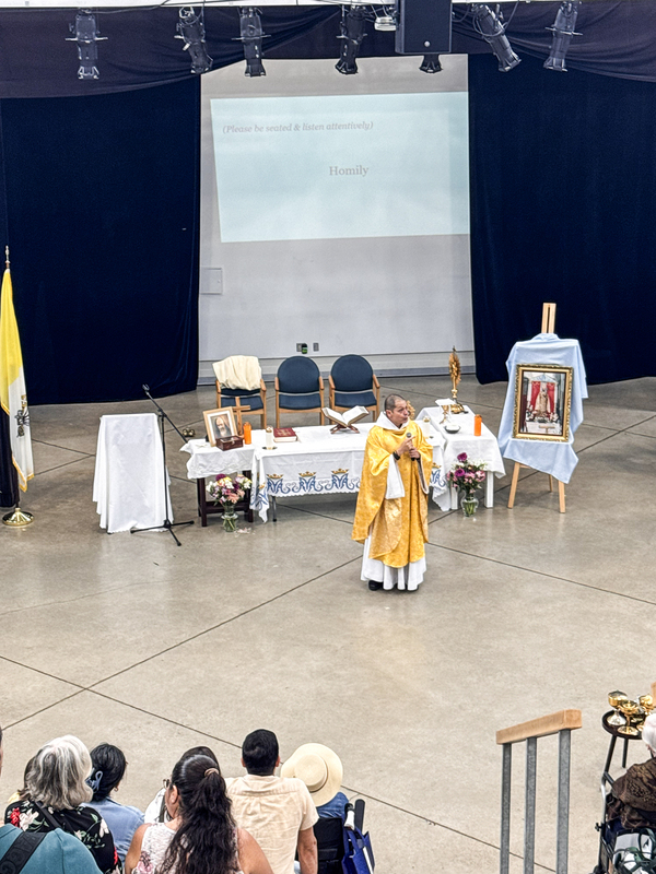 Photo of Father Gustavo leading the Mass
