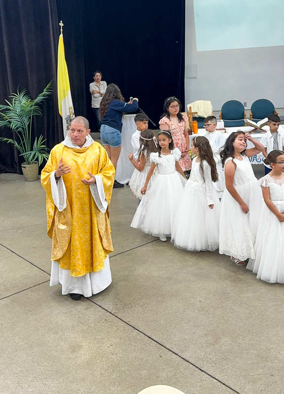 Photo of Father Gustavo leading the Mass