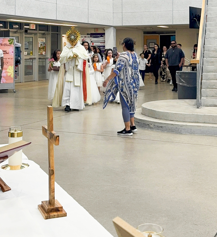 Photo of Father Gustavo leading the Mass