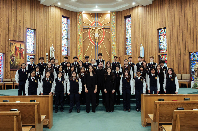 Group photo of CCAA students and staff in the Church for the recording