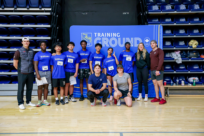 Group photo of JCM athletes with trainers at RBC Training Ground