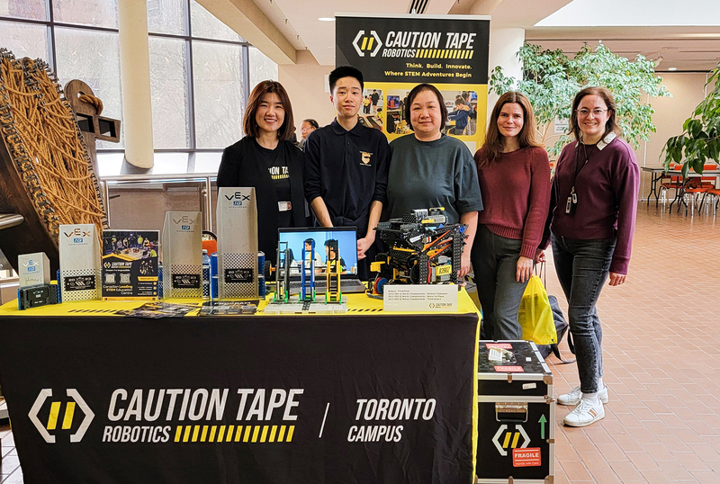 Photo of TCDSB staff with the sponsors Caution Tape
