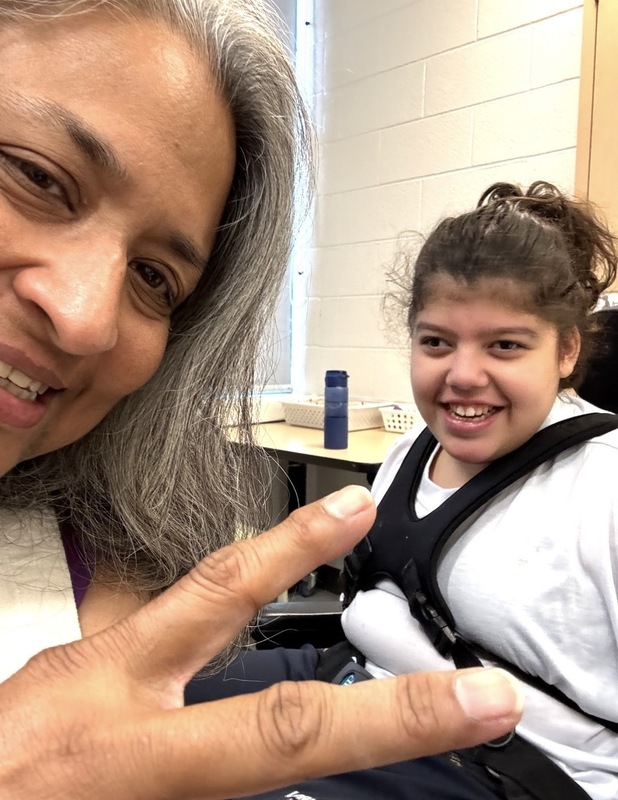 Photo of Ms. Devine with Darlin