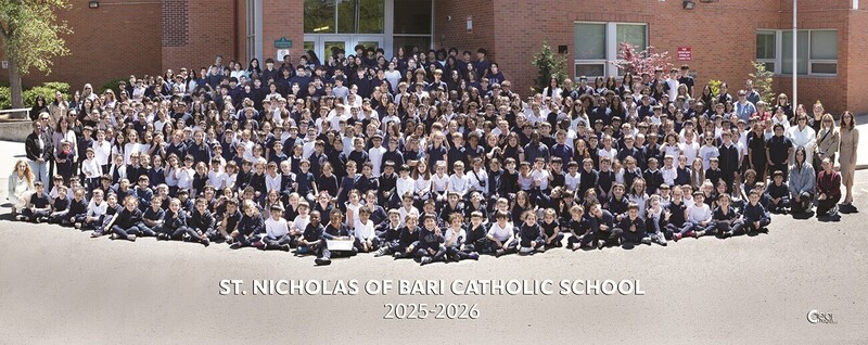 Group photo in front of the St. Nicholas of Bari Catholic School building of the 2025-2026 graduating class and the school staff