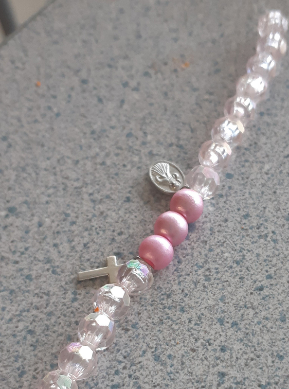Photo of religious bracelets made by the students to honor the Immaculate Heart of Mary