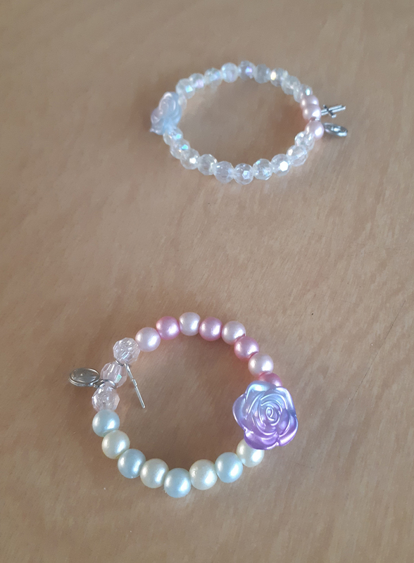 Photo of religious bracelets made by the students to honor the Immaculate Heart of Mary