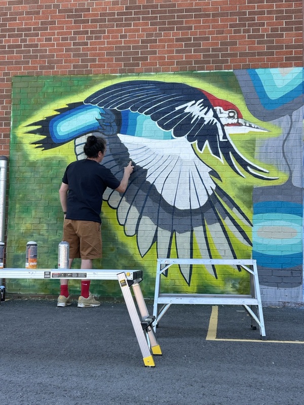 St. Angela Catholic School Unveils Indigenous Mural by Artist Que Rock