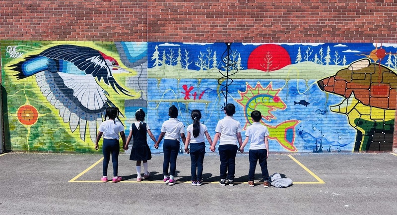St. Angela Catholic School Unveils Indigenous Mural by Artist Que Rock