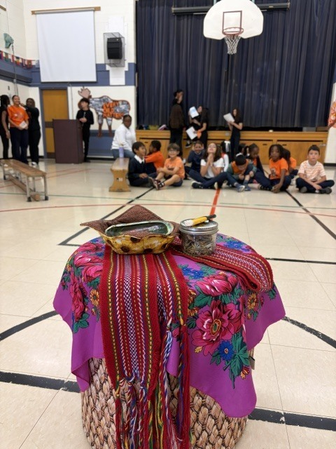 Photo of OLW students witnessing the smudging ceremony at the assemblya
