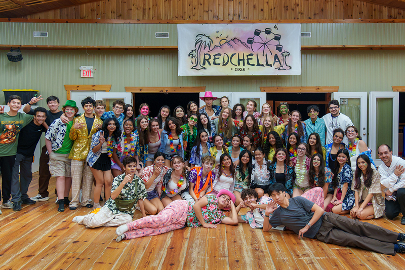 Group photo of Redmond students and staff posing together at Camp Muskoka