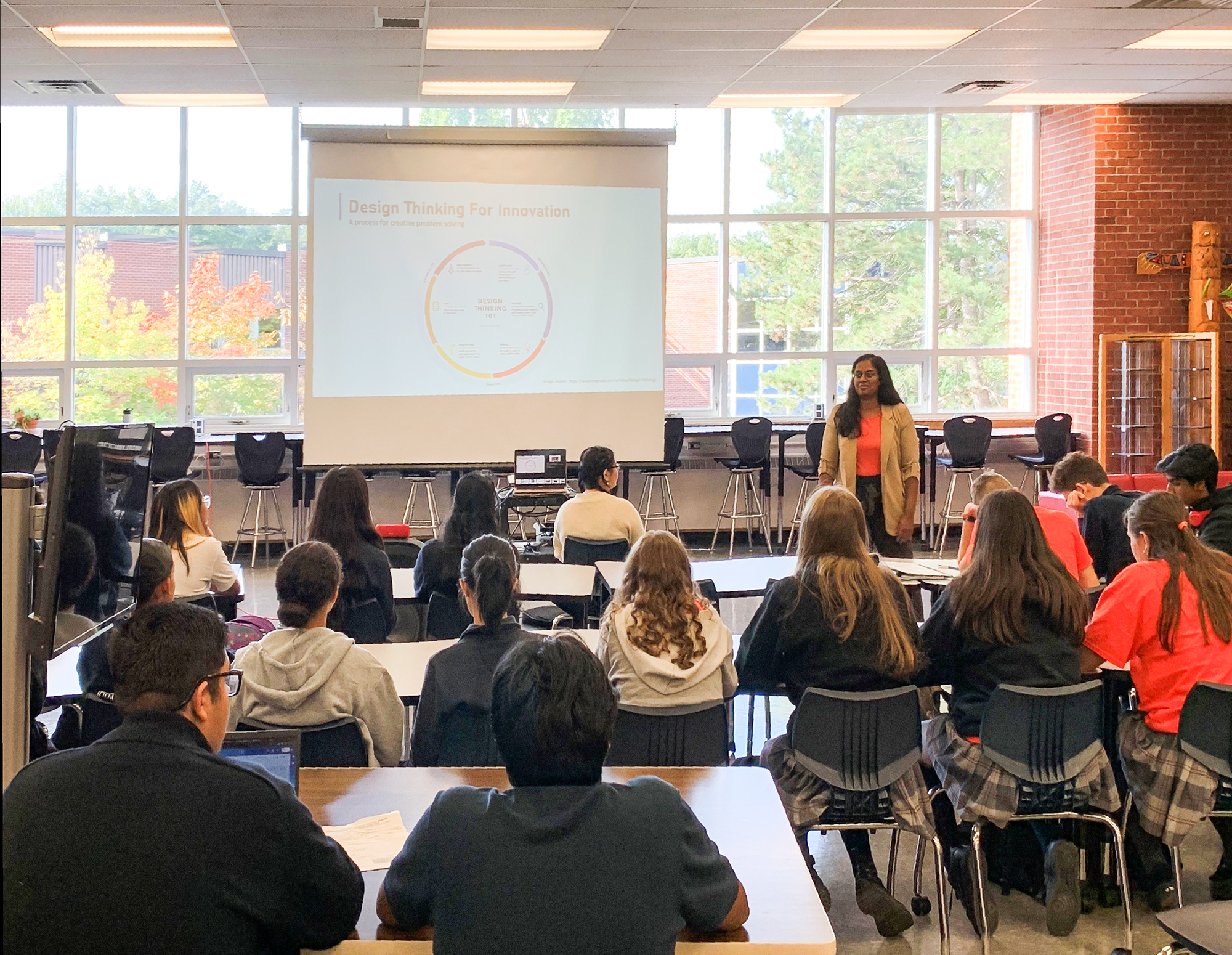 SJPII students listen to a presentation by Dr. Melanie Ratnam