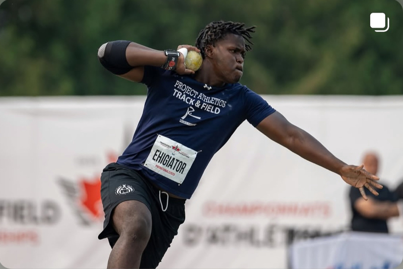 Photo of Eghosa on the field getting ready to throw