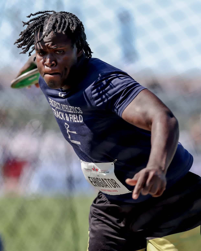Photo of Eghosa on the field getting ready to throw