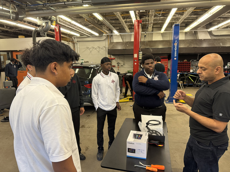 Photo of Sidd talking to students in the JCM transportation program
