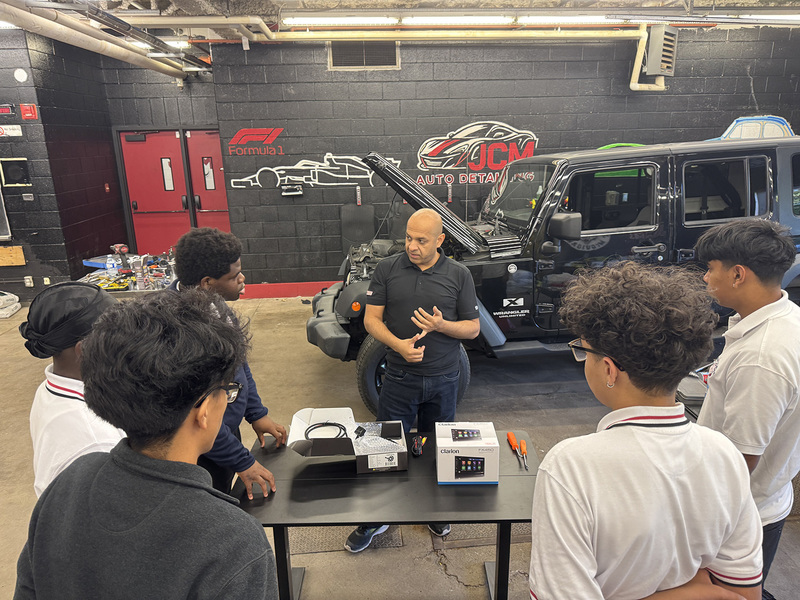 Photo of Sidd talking to students in the JCM transportation program