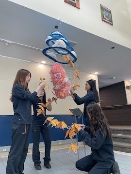 Photo of Cardinal Carter students working on the art intsallation