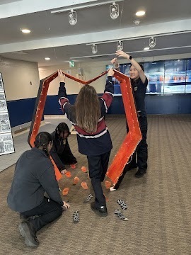 Photo of Cardinal Carter students working on the art intsallation