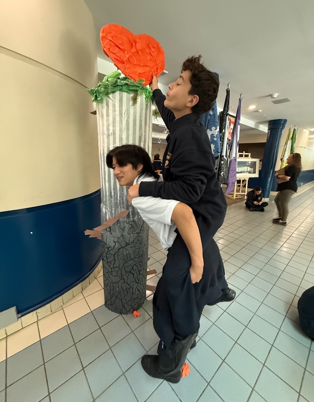 Photo of Cardinal Carter students working on the art intsallation