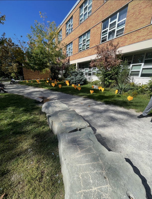 Photo of orange hearts on the school grounds