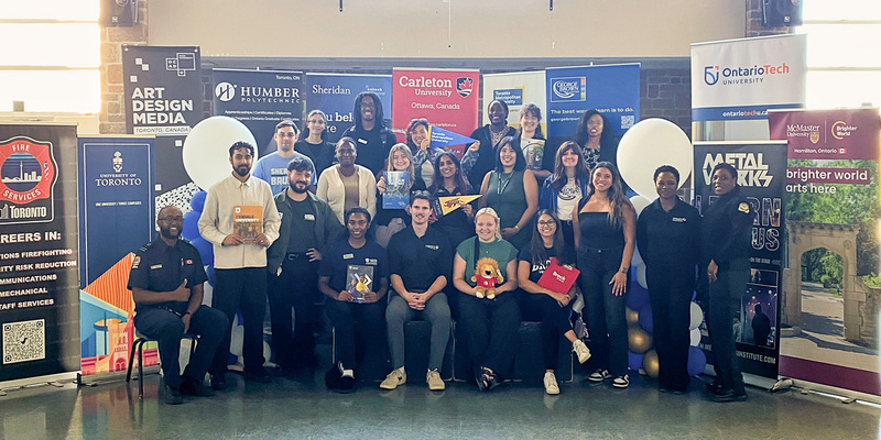 Group photo of Father Henry Carr students and fair presenters at the Post-Secondary fair