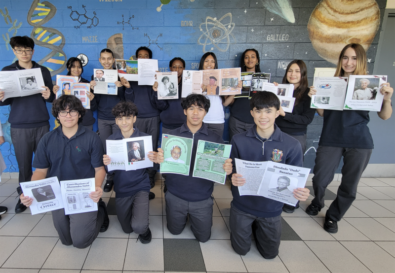 Group photo of Marshall McLuhan students with their projects
