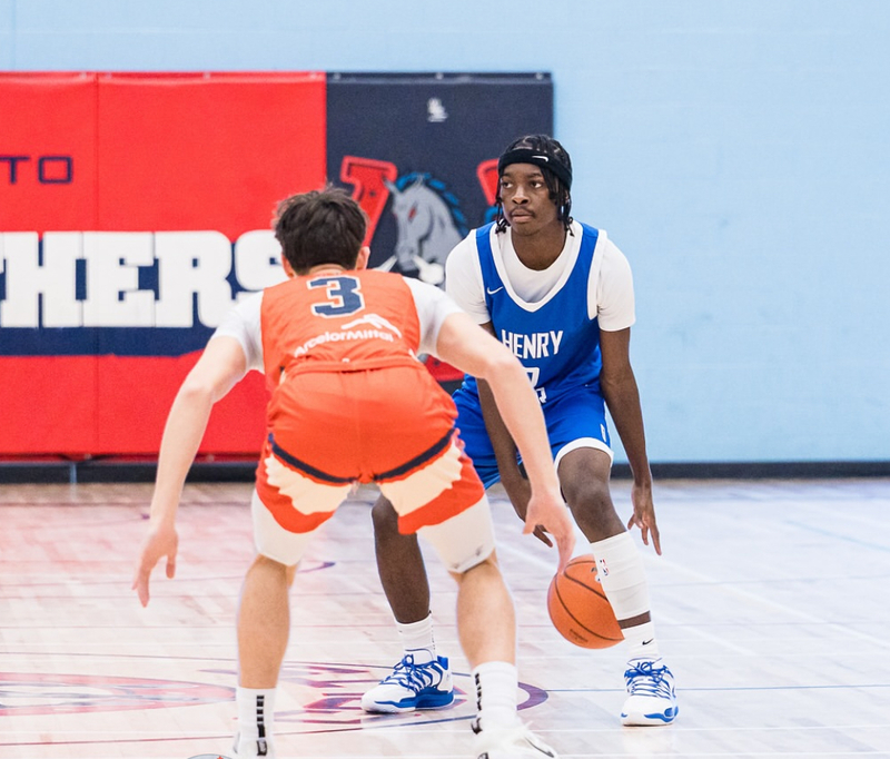 Students playing basketball in a gym