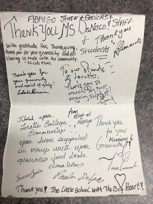 Photo of the handmade thank you card that was created by the Seniors at Abrigo, signed by every employee as a collective gesture of thanks and kindness